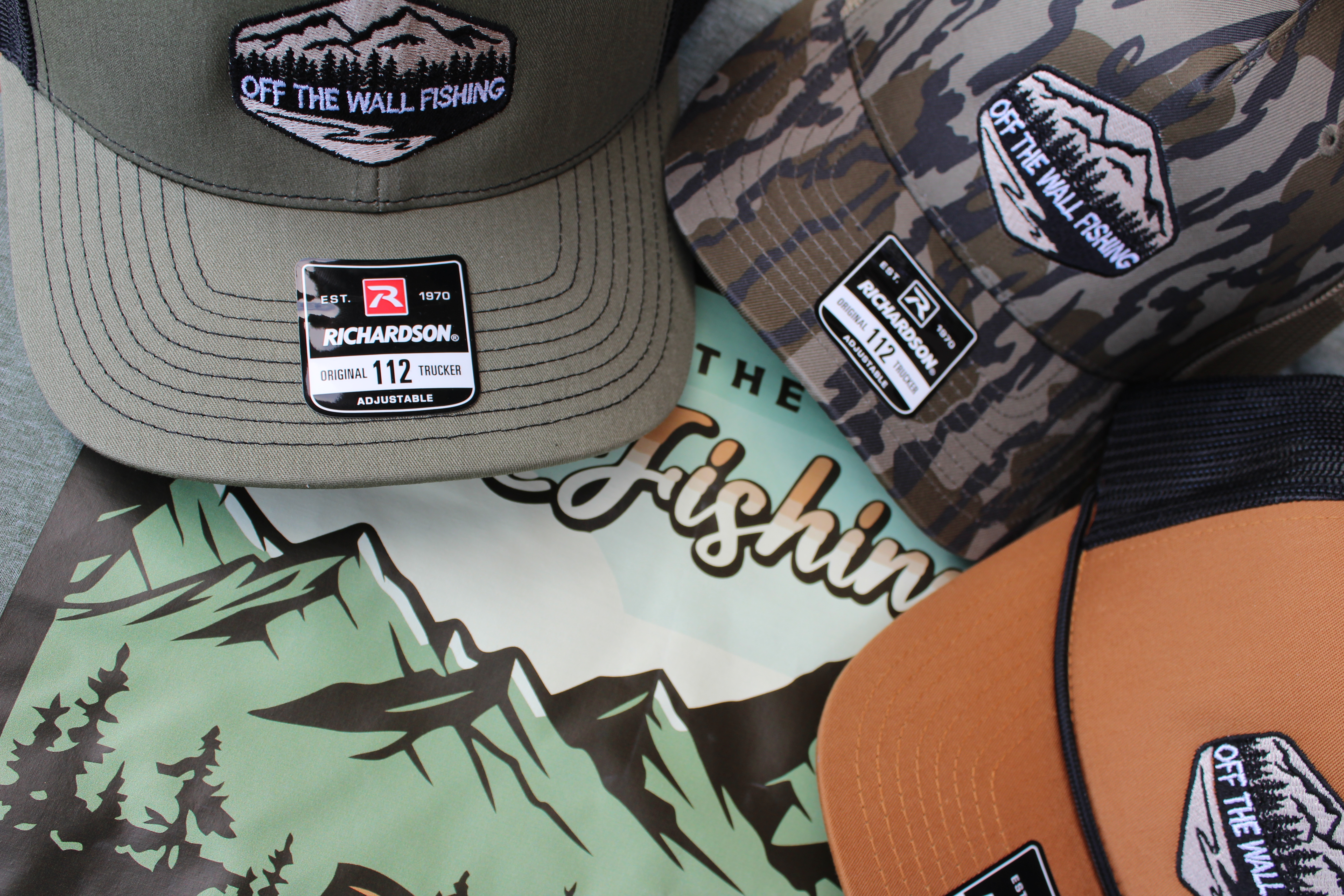 Off The Wall Fishing hats and tshirt from a close perspective